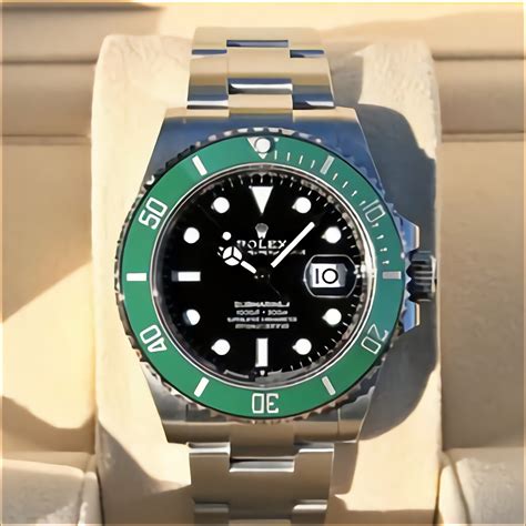 used rolex submariner green bezel